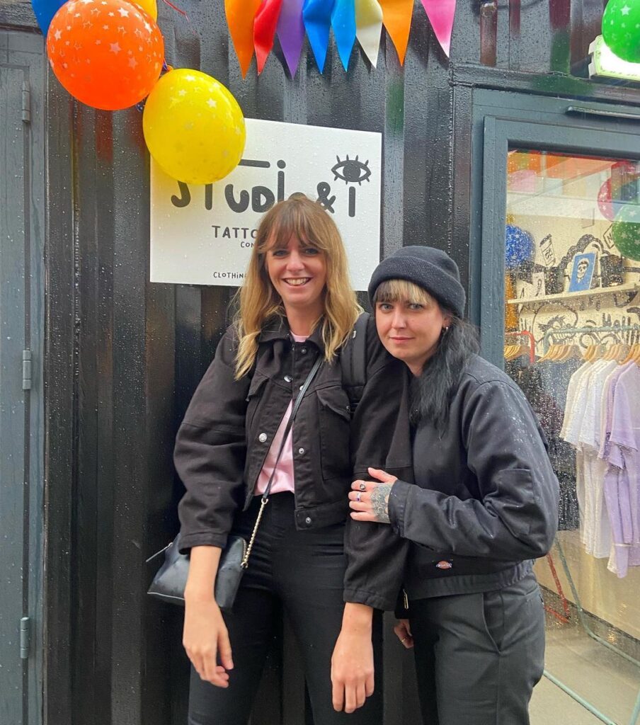 Two women outside a Studio & I unit
