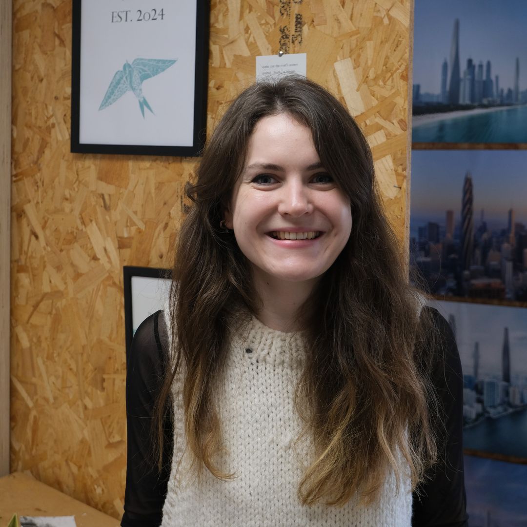 A photo of Becca smiling at the camera