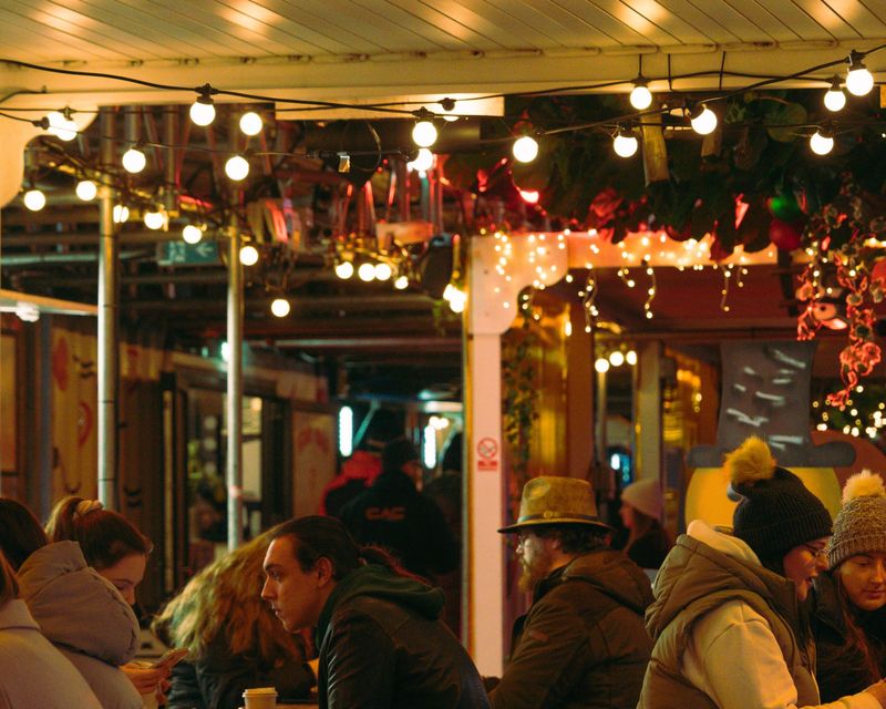 A photo of people sat inside Spark