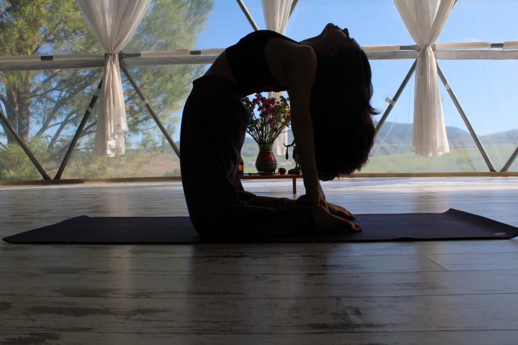 Jess doing a back bend in vinyasa class