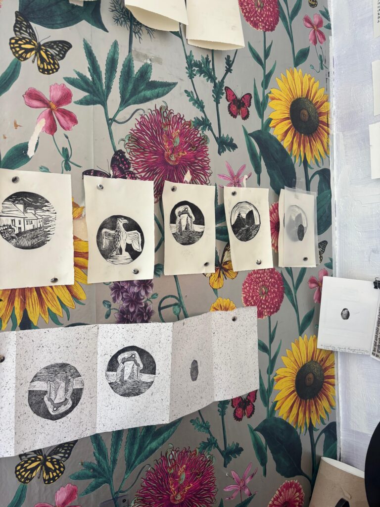 Rebecca Drake working on lino cut book